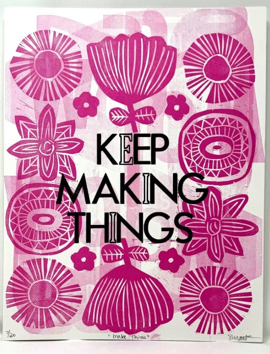 Letterpress print with magenta graphic floral designs and a big slogan KEEP MAKING THINGS in black capital letters