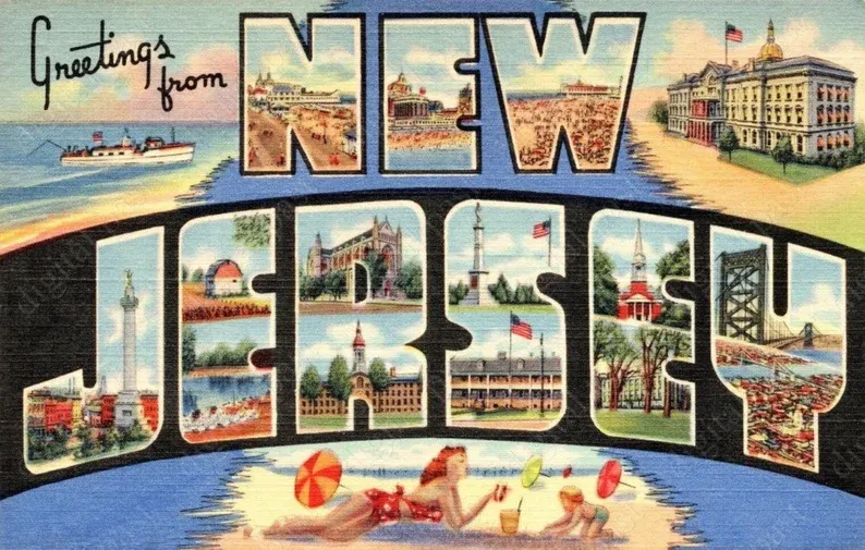 Vintage postcard that reads Greetings from New Jersey and shows a white pinup gal lounging on a beach, the state capitol building, and other Americana :/